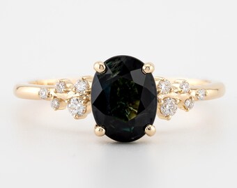 Oval Shape Natural Sapphire and Natural Diamond Cluster Setting engagement ring