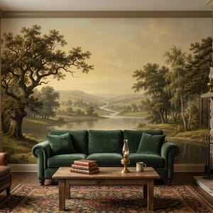 May include: A cozy living room scene featuring a dark green sofa, a wooden coffee table with books, and a fireplace. A landscape mural of a river and trees adorns the wall. A warm, inviting space.