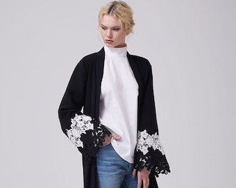 Abaya negra abierta de encaje