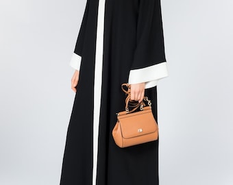Abaya lisa en blanco y negro