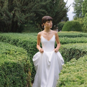 Ethereal Elegance Bohemian Wedding Dress with Flowing Maxi Skirt, Thin Straps in unique style, beautiful flare, and Deep Neckline image 7