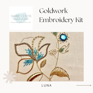May include: Goldwork embroidery kit featuring a floral design with blue and gold thread, beads, and a single blue gemstone. The kit is called "Luna" and is from Maire Curtis Lakeland Studio.