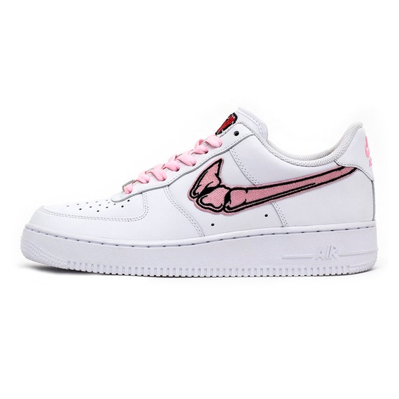 pink and white tennis shoes