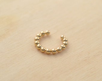 Fake gold-plated ball piercing - Gaïa