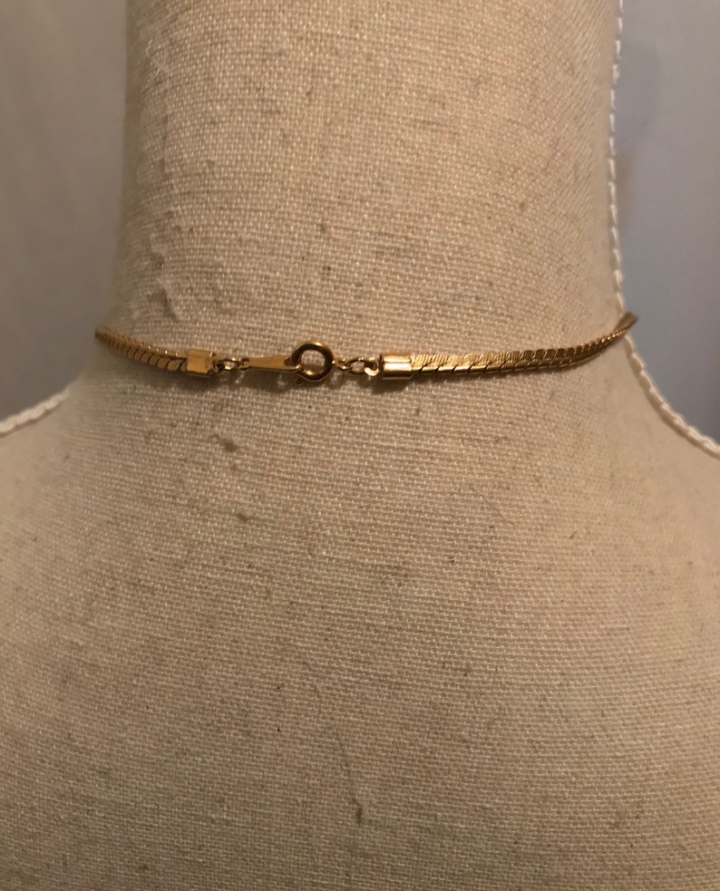 1970\u2019s enamel and gold elephant pendant necklace