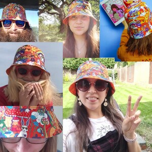 May include: A group of people wearing colorful bucket hats with a psychedelic pattern. The hats feature a variety of colors, including orange, yellow, blue, and green. The hats are made of a soft, comfortable fabric and have a wide brim.