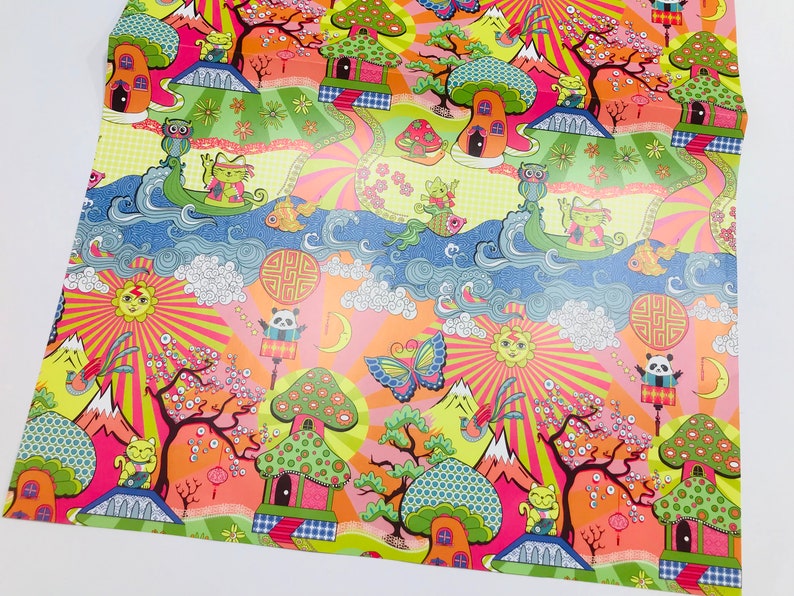 May include: Colorful wrapping paper with a whimsical design featuring mushrooms, mountains, flowers, and animals. The paper has a bright orange, pink, and green color scheme.
