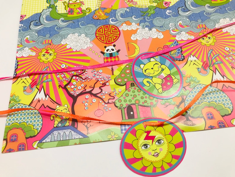 May include: A colorful wrapping paper with a pink, orange, and green design. The paper features a variety of whimsical characters, including a cat, a panda, and a sun. The paper is decorated with ribbons and stars. The paper is perfect for wrapping gifts for a birthday or other special occasion.