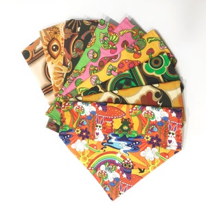 May include: A set of eight colorful fabric squares with psychedelic patterns, including mushrooms, flowers, and geometric designs. The fabric squares are arranged in a fan shape.