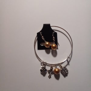 Silvertone Pandora style closed cuff brushed finish charm bracelet