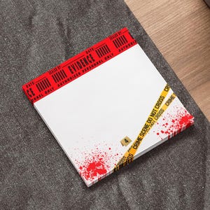 May include: A white notepad with a red and black crime scene tape border. The tape reads "DATE: SEALED BY: EVIDENCE PERSONNEL ONLY AUTHORIZED PERSONNEL ONLY AUTHORIZED" and "CRIME SCENE DO NOT CROSS CRIME SCENE DO NOT CROSS". The notepad has red blood splatter on it.