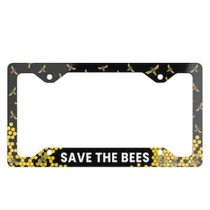 May include: Black license plate frame with a yellow honeycomb and bee pattern. The text "SAVE THE BEES" is printed in white on the bottom.