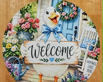 White Porch Goose With Welcome Sign.
