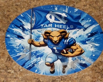 8" Aluminum round ram carrying a football and flag sign