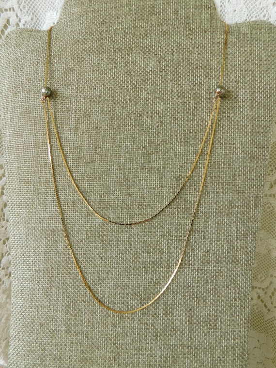 Double Strand Chain Necklace. Double strand Slide 