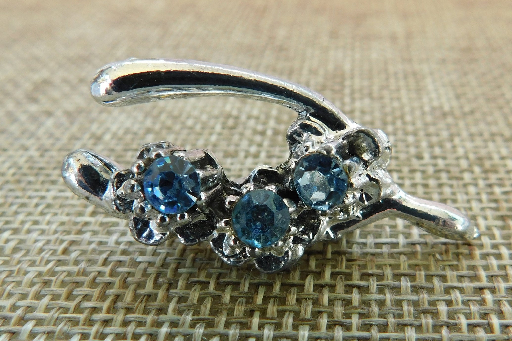 Vintage Blue Rhinestone Wishbone Pin: Silver Floral Good Luck