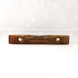 May include: A set of three ceramic mugs with a speckled, matte finish. Each mug features a different color: light blue, cream, and gray. The mugs have a simple, modern design and a comfortable handle.