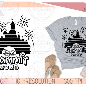 May include: Black and white digital design featuring a silhouette of the Disney castle with fireworks and the text "D2 Summit 2023".