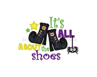 May include: A Halloween-themed design featuring black witch boots with purple and yellow accents, the phrase "It's ALL about the shoes," a yellow star, green stars, and a hanging spider. The design is on a white background.