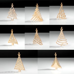 Christmas trees of 8 different designs. Laser-cut Christmas trees are made of wood.