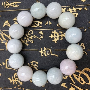 18.7 mm Natural light green jade beaded engraved flower bracelet(Elastic rope）