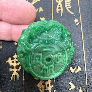 green jade carved round  chinese dragon charm pendant
