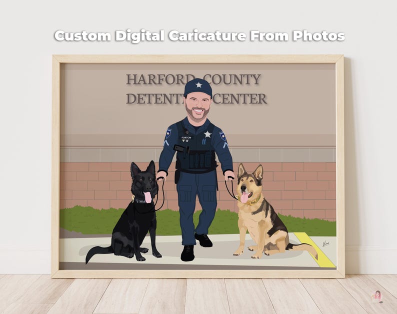 May include: A framed digital caricature featuring a police officer with two dogs. The officer is in uniform, and the dogs are a black German Shepherd and a tan and black German Shepherd. The text "Custom Digital Caricature From Photos" is at the top.