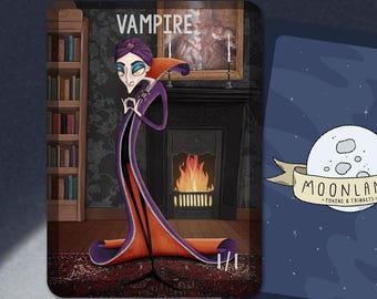 May include: A purple and orange vampire character with a turban and a cape stands in a room with a fireplace and a bookshelf. The character is holding a hand up to their chin and has a serious expression on their face. The card is titled "Vampire" and is part of the "Moonland Tokens & Trinkets" collection.