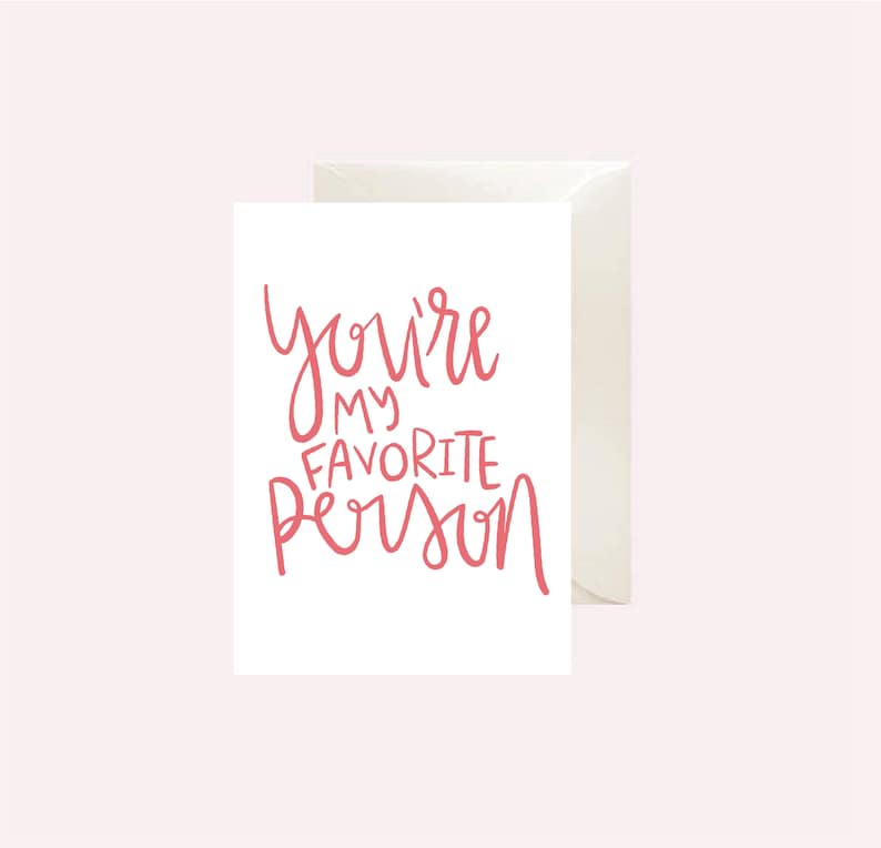 May include: A white card with the text "You're my favorite person" written in pink cursive.