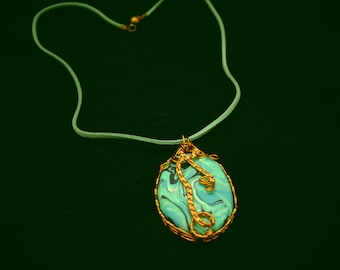 Wire wrapped polymer clay pendant