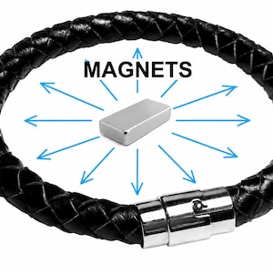 May include: Black braided leather bracelet with a silver clasp. A silver rectangular magnet is in the centre, with the word "MAGNETS" above it. Blue arrows radiate from the magnet, indicating magnetic force.