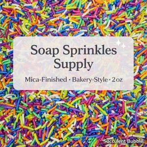 May include: A vibrant, colorful assortment of soap sprinkles in a variety of shapes and sizes. The image features a mix of blue, green, yellow, orange, and purple sprinkles. Text on the image reads "Soap Sprinkles Supply" and "Mica-Finished • Bakery-Style • 2oz."