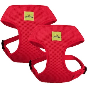 May include: Two red mesh dog harnesses with adjustable straps and a yellow logo that says "Fun Active Dogs".