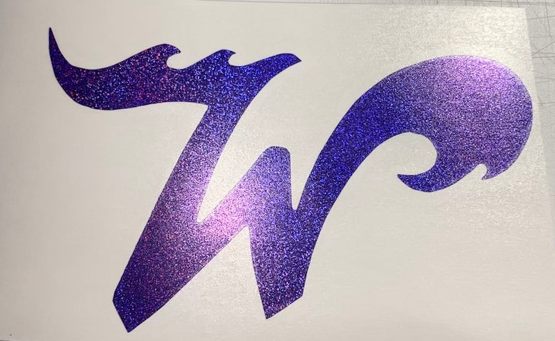 May include: A purple glitter vinyl decal of the letter "W" in a stylized font. The letter is outlined in a wavy design.