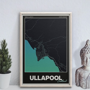May include: A framed map print of Ullapool, Scotland, with a teal and black color scheme. The map shows the town's layout and surrounding area. The word "Ullapool" is printed in white at the bottom of the frame.