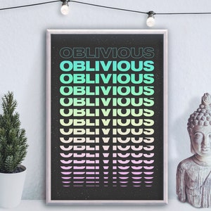 May include: A black and white poster with the word "Oblivious" repeated in a gradient of colors, from teal to pink. The poster is framed and hanging on a wall.