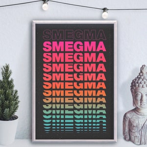 May include: A framed print with a black background and the word "SMEGMA" repeated in a rainbow gradient of colors.