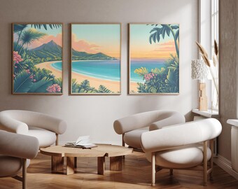May include: Three framed wall art prints depicting a tropical beach scene with mountains, palm trees, and pink flowers under a soft sunset sky. The artwork features a colour palette of turquoise, peach, green, and blue, displayed in a living room.