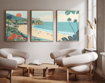 May include: A set of three framed wall art prints depicting a coastal landscape with a sandy beach, turquoise ocean, palm trees, and a red sun. The artwork features a palette of soft blues, greens, and warm beige tones, showcasing a serene seaside scene.