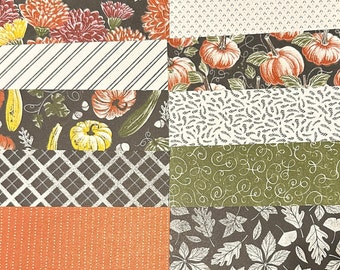 May include: A collection of patterned paper featuring fall themes. The patterns include pumpkins, leaves, stripes, and floral designs. The papers are in various colors, including orange, brown, green, and white.