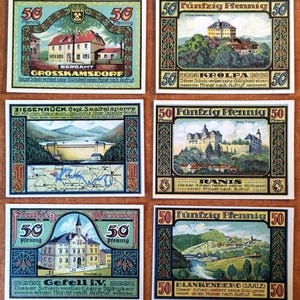 May include: Six rectangular German Notgeld banknotes, each with a 50 Pfennig denomination. The notes feature colorful illustrations of buildings, landscapes, and dams, with ornate decorative borders and German text identifying locations like Grosskamsdorf.