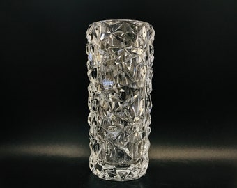 Lena Bergström, Orrefors polished crystal glass cylindrical vase "Carat" with irregular symmetric relief, Swedish modernist design, Retired