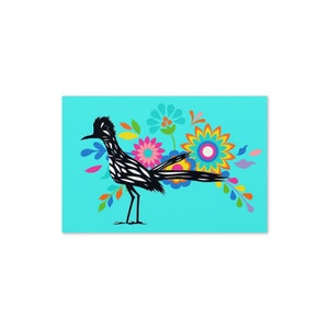 May include: A black silhouette of a roadrunner bird with a long tail standing in front of a cluster of colorful flowers on a turquoise background.