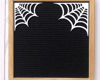Corner spider web for letterboard