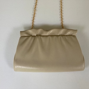 Beige clutch purse