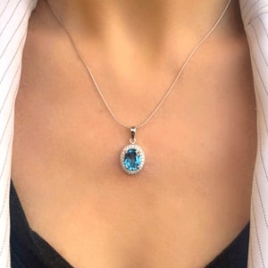 Genuine Swiss Blue Topaz Halo Oval Silver Pendant Necklace