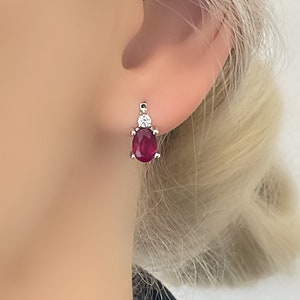 Genuine Ruby Oval Stud Silver Earrings with Solitaire White Topaz