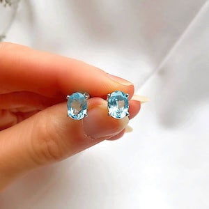 Genuine Sky Blue Topaz Oval Solitaire 6 x 8 mm Silver Stud Earrings