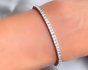 Pulsera de tenis de eternidad de plata con canal de topacio blanco genuino