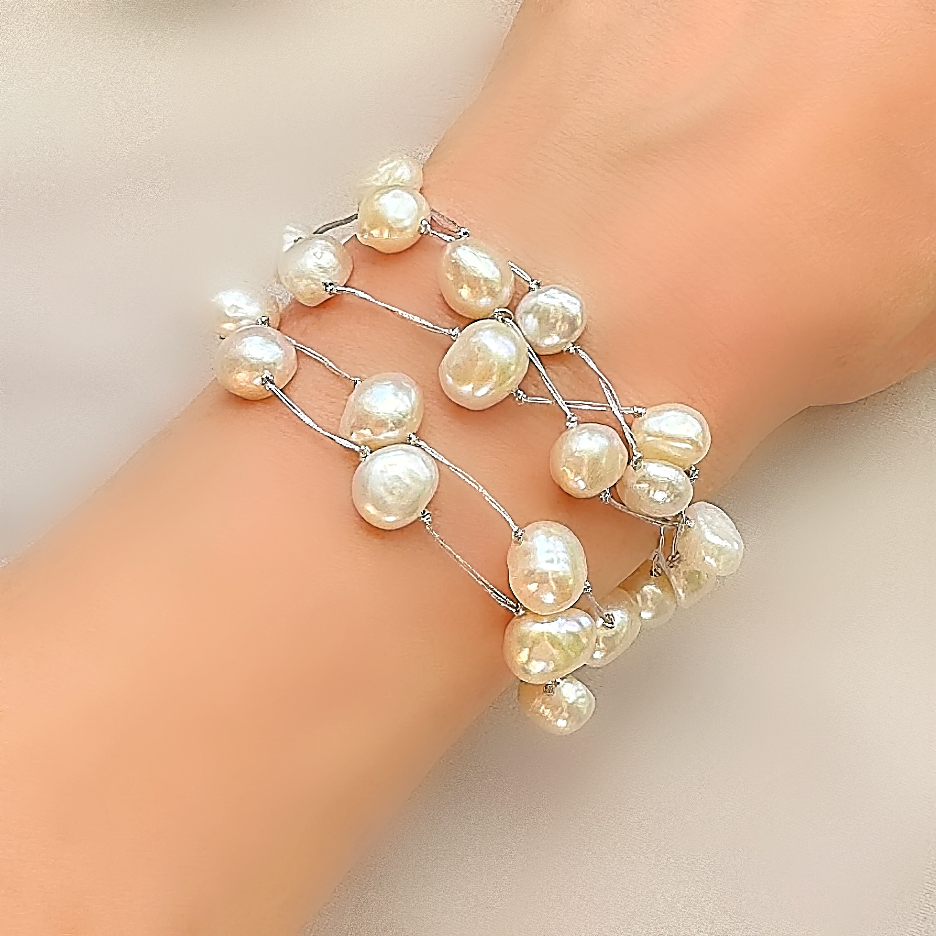Baroque Pearl Floating Multi Stranded Bracelet With Silver